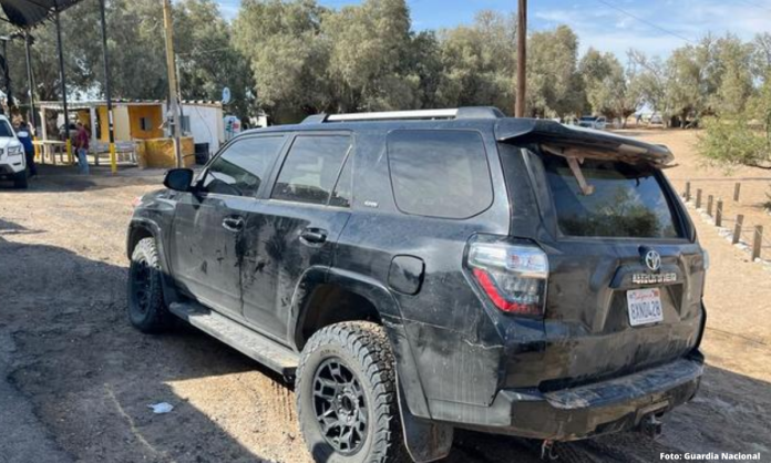 Aseguran 14 camionetas cargadas con arsenal bélico y droga en Sonora